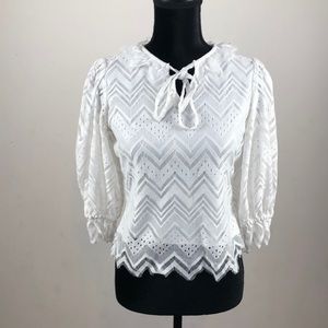 Athena white Tie-up neck, puff sleeve lace top. Wonen’s small.